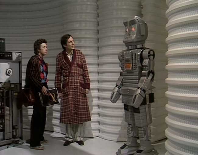 Marvin the Paranoid Android with Arthur and Ford from the older BBC series.